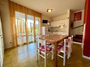 A kitchen or kitchenette at Homely villa with private garden and shared pool