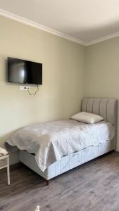 Voodi või voodid majutusasutuse Tazia Appartments toas