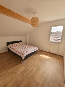 Giường trong phòng chung tại Villa proche du centre