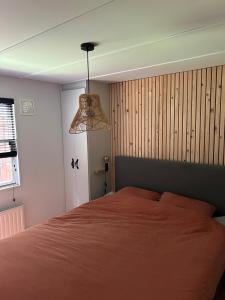 Postel nebo postele na pokoji v ubytování Vakantiehuis met Sauna