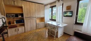 Kuchyň nebo kuchyňský kout v ubytování Studio Crans Center