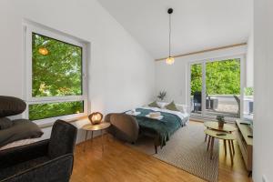 Un lugar para sentarse en Flussperle Miesbach - Erholung pur direkt an der Schlierach - Dachterrasse mit Grill, kostenloses Parken