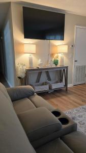 a living room with a couch and a table at The Miller's Retreat in Dothan