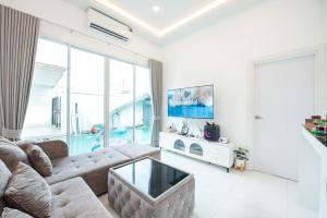Televisyen dan/atau pusat hiburan di Mina Pool Villa