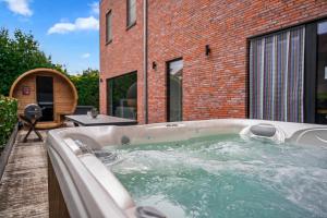 Fotografie z fotogalerie ubytování NEW - De sheeper - 10Personen - 5slaapkamers - Sauna - Jacuzzi v destinaci Riemst