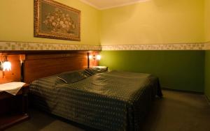 Postel nebo postele na pokoji v ubytování Grand Hotel Residence - Boutique Hotel