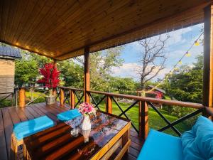 Balcone o terrazza di Деревянный дом