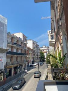 a view of a city street with cars on the road at NUOVO E CENTRALISSIMO in Civitanova Marche