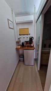 Kuchyň nebo kuchyňský kout v ubytování Ladario Studios + 22 fotografií