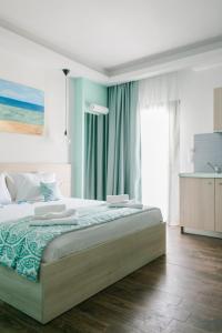 Posteľ alebo postele v izbe v ubytovaní Anastasia Rooms
