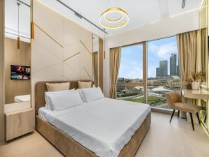 Ένα ή περισσότερα κρεβάτια σε δωμάτιο στο Burj Khalifa -New Year Show ,Dubai Fountain , 5 mins from Dubai Mall +32 φωτογραφίες