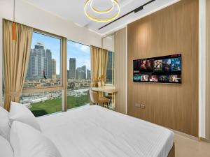 Μια τηλεόραση ή/και κέντρο ψυχαγωγίας στο Burj Khalifa -New Year Show ,Dubai Fountain , 5 mins from Dubai Mall