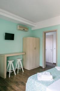 Posteľ alebo postele v izbe v ubytovaní Anastasia Rooms