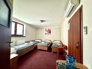 Posteľ alebo postele v izbe v ubytovaní Hotel Paola