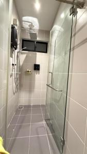 a shower with a glass door in a bathroom at Legoland-JB Medini Luxury Play & Stay 5pax in Iskandar Puteri