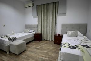 Letto o letti in una camera di Hotel Soan