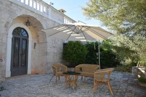 Patio nebo venkovní prostory v ubytování GuesTrulli