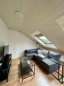 Posezení v ubytování Charmante Dachgeschosswohnung bis zu 6 Gäste