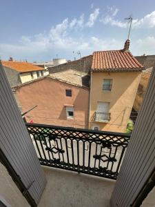 Balkón nebo terasa v ubytování Charmant appartement climatisé