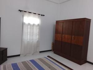 Postel nebo postele na pokoji v ubytování Neptune house