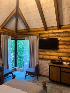 Voodi või voodid majutusasutuse Getahovit Resort toas