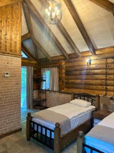 Voodi või voodid majutusasutuse Getahovit Resort toas
