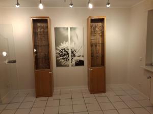 a room with two doors and a picture on the wall at FeWo21 Ferienwohnung im schönen Münsterland in Lüdinghausen +53 photos