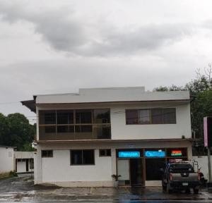 a building with a truck parked in front of it at Hotel Pensión Galicia in Obaldía +41 photos