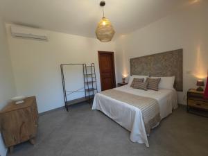 Postel nebo postele na pokoji v ubytování Villa Denu Salento - Intera Dimora con Piscina ad uso esclusivo
