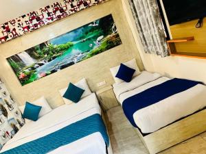 Postel nebo postele na pokoji v ubytování Hotel Hayat Inn