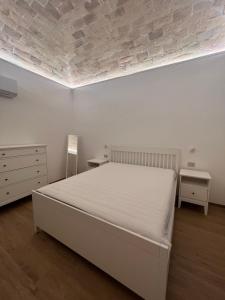 Ένα ή περισσότερα κρεβάτια σε δωμάτιο στο Cledo mare B - Luxury stay