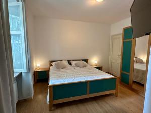 Postel nebo postele na pokoji v ubytování Villa Milada