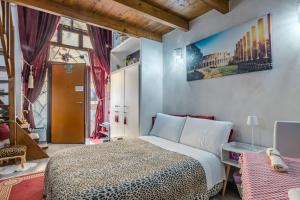 a bedroom with a bed with a leopard print bedspread at Diana Romantic Loft in Rome