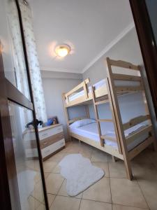Кровать или кровати в номере Sina House +7 фотографий