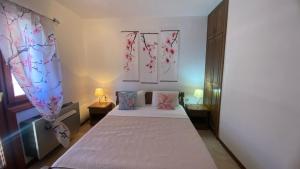 Postel nebo postele na pokoji v ubytování Luxury Hotel Dubrava Budva
