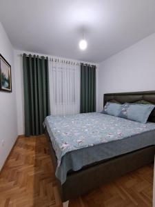 Postel nebo postele na pokoji v ubytování Apartman PETRA QUEEN
