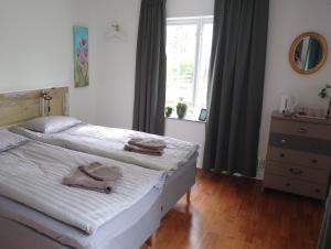 Postel nebo postele na pokoji v ubytování Ales BnB