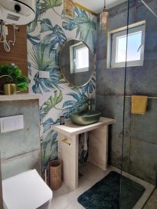 Koupelna v ubytování Apartment Venera + 37 fotografií