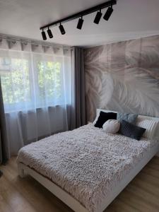Postel nebo postele na pokoji v ubytování Wieliczka4You