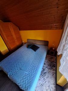 Postel nebo postele na pokoji v ubytování Vikendica Kod Čake,Subotica + 19 fotografií