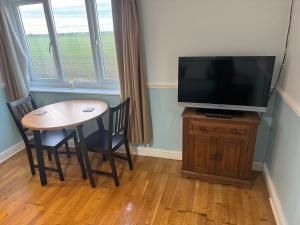 Et tv og/eller underholdning på Cottage in Rural Lincolnshire