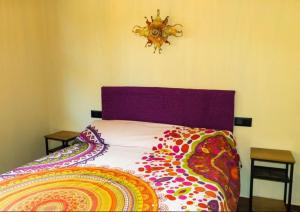 A bed or beds in a room at Casiñas de Acevedo