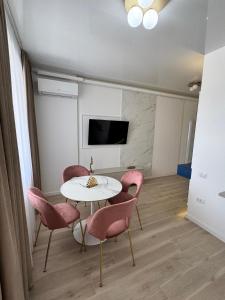 Et tv og/eller underholdning på Bing apartment + 13 billeder