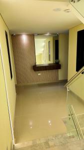 TV a/nebo společenská místnost v ubytování Hotel Jelt Aeropuerto