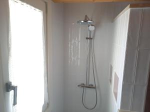 a shower in the corner of a bathroom at Luce del Mattino in San Vito al Tagliamento +15 photos