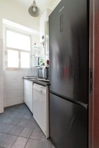 A kitchen or kitchenette at Entire home/apt in Milan near Fairs and Navigli Még 2 kép
