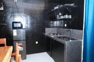 O bucătărie sau chicinetă la À 2 pas de la plage, 80 metres de la mer, 1 SALON, 1 CHAMBRE et 2 SDB +36 fotografii