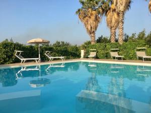 Bazén v ubytovaní Baglio Cudia Resort alebo v jeho blízkosti