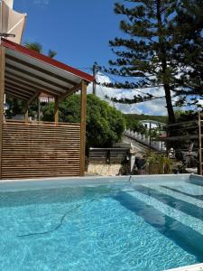 Bazén v ubytování Caraibes Harmony - Vue Mer, Spa, piscine & confort nebo v jeho okolí