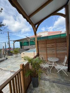 Balkón nebo terasa v ubytování Caraibes Harmony - Vue Mer, Spa, piscine & confort